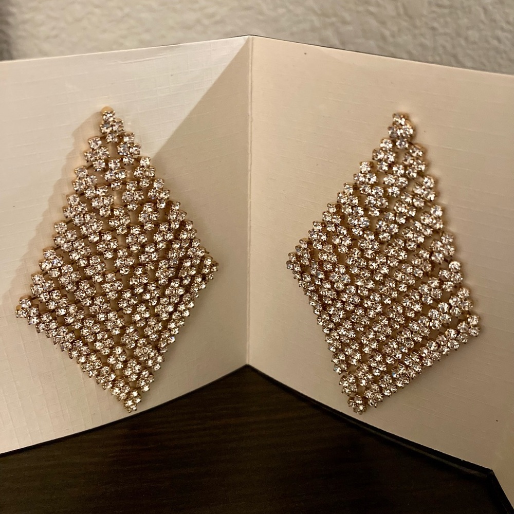 Dazzling Earrings. Movement. Mesmerizing. Rhinestones in Gold Tone.